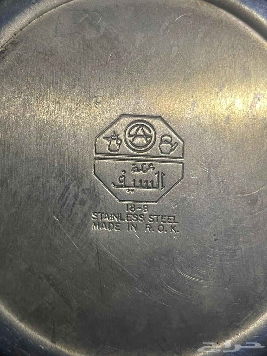 Dallah and sword pitcher. And three pitcher set. And handleless jug63763564339715112