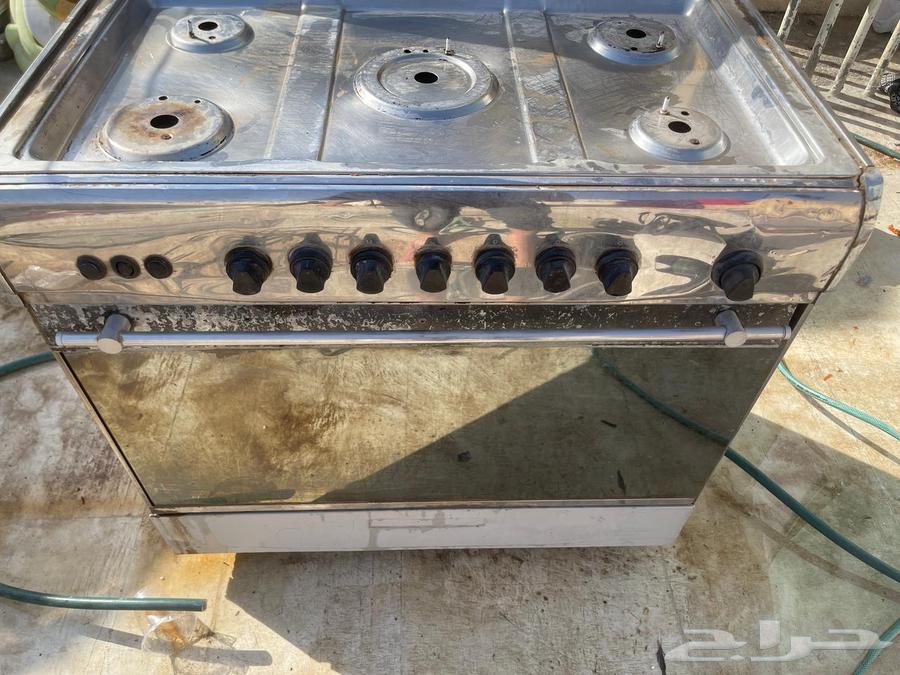Gas stove with five burners, working both top and bottom as required63762979928194111