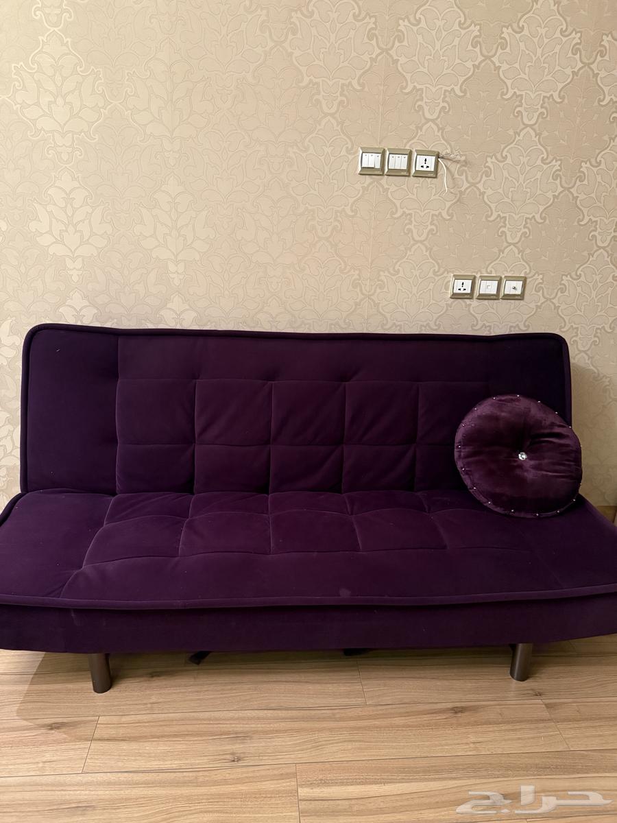 A sofa from Home Center that can be opened and turned into a bed63782294171521110