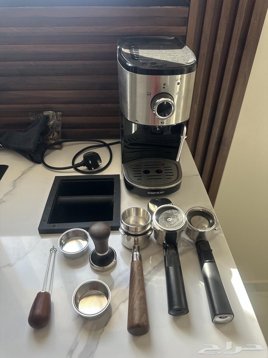 Used espresso coffee machine with its accessories63784090180994113