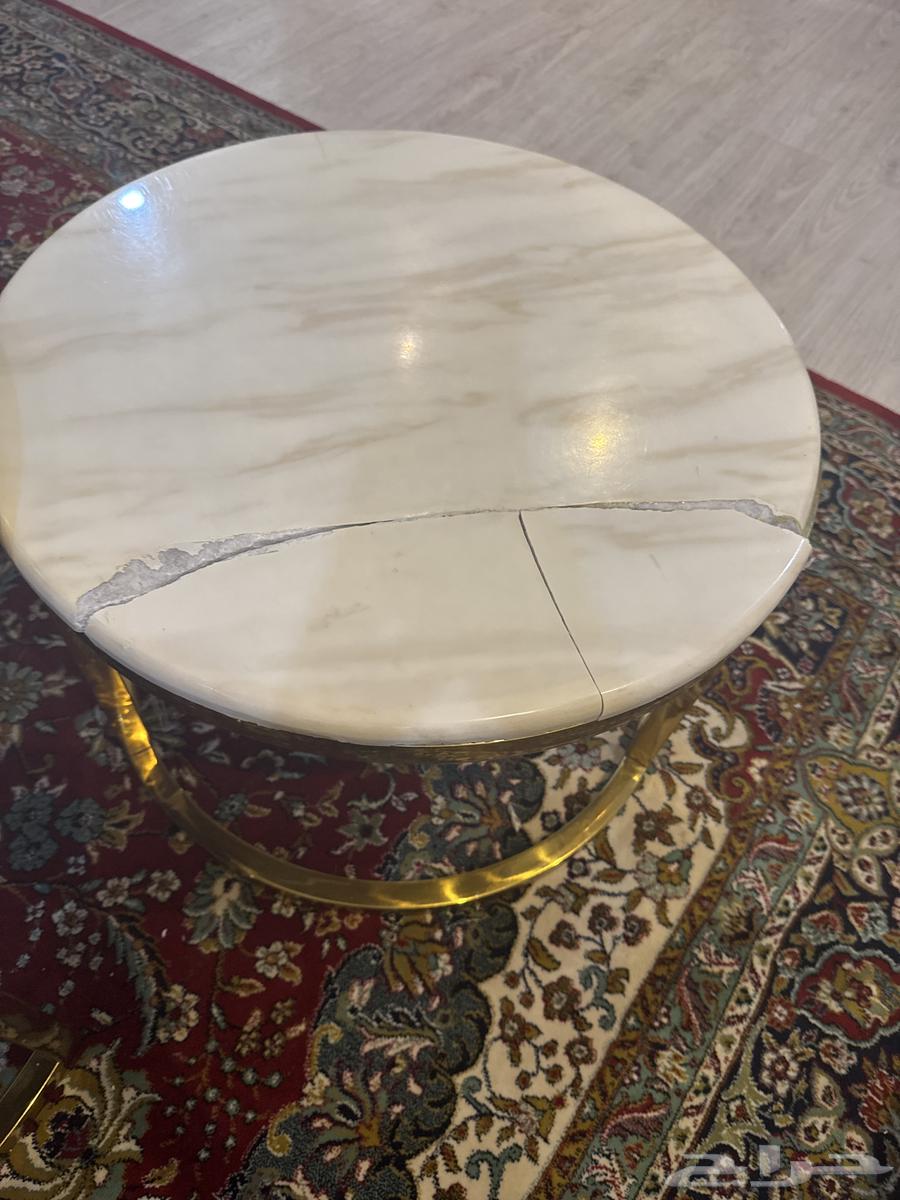 طاولة رخام. بحديد أستيل ذهبي63774303907841110