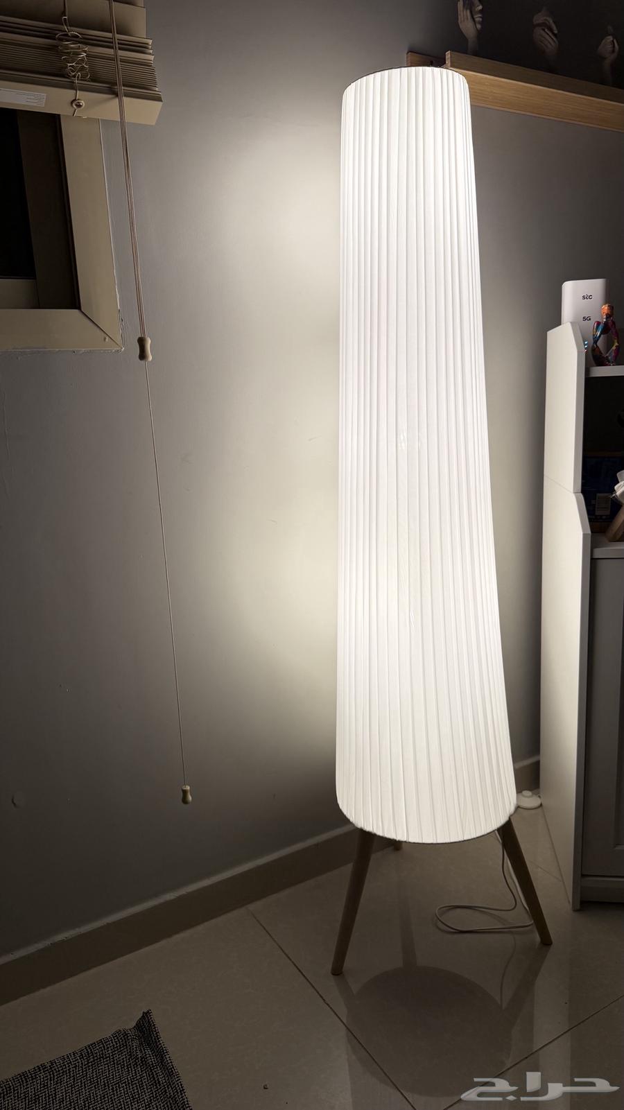 I have a new lamp with its box and a new curtain in the same shape63788632815618111