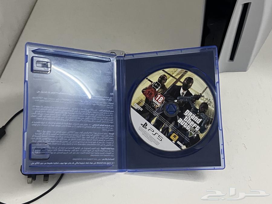 PlayStation 5 with headset, controller, and Grand Theft Auto 5 game63799633905026112