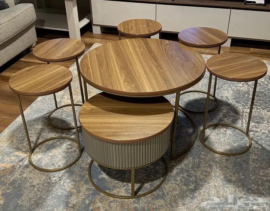 Two nested coffee tables and 8 chairs63792220859523110