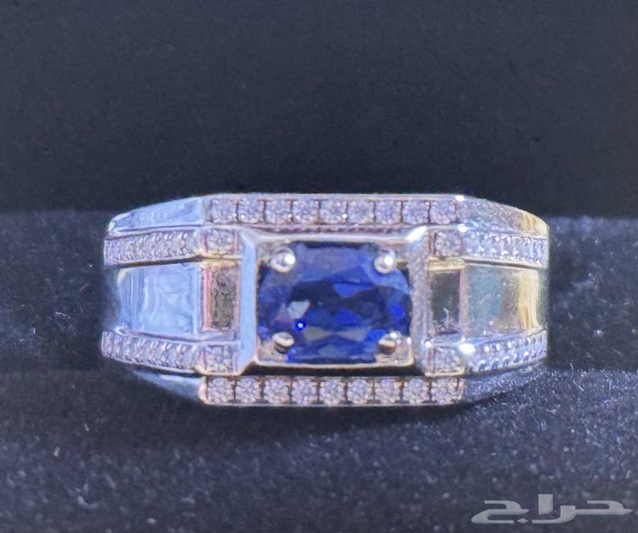 Silver ring with outer layer of 14K gold and 1CT sapphire set with diamonds63805456965249110