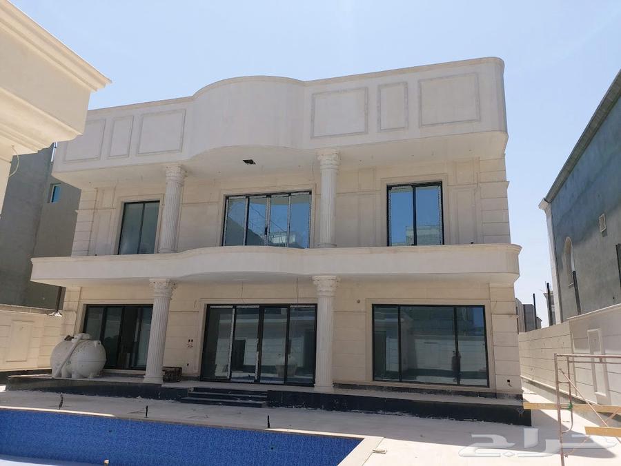 Custom aluminum windows and wooden doors, glass, railings, and furniture636139087202591122