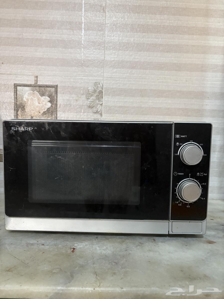 Philips iron and Sharp microwave63613917649155111