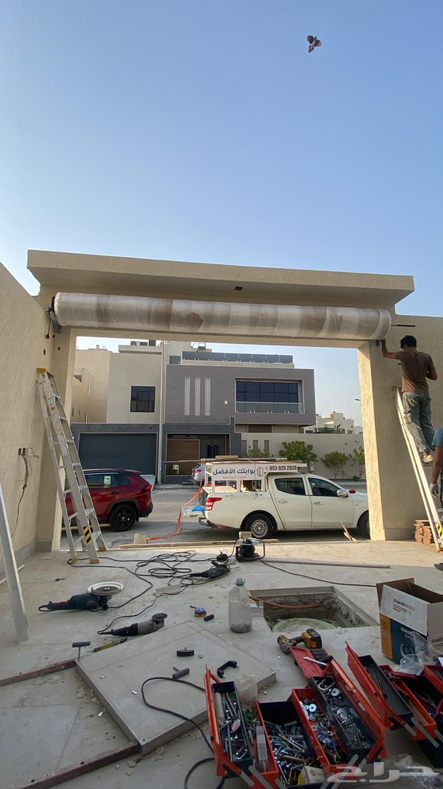 باب كراج تركيب صيانة63381376353025113