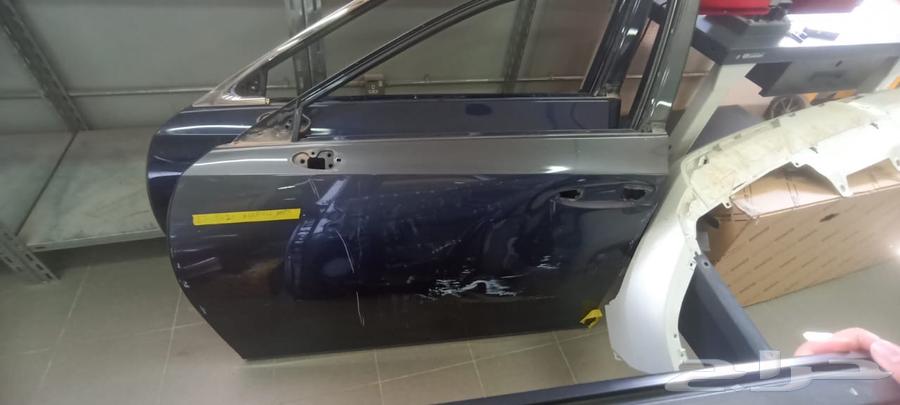 Two Lexus 23 model doors (driver and passenger behind the driver)64200255996674112