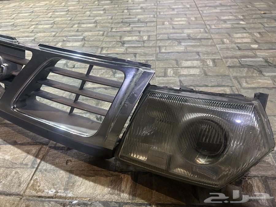 طقم شمعات وشبك امامي بترول نيسان 199964262962549890112