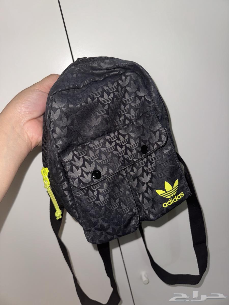 Brand new Herschel and used Adidas mini bag64044421254145113