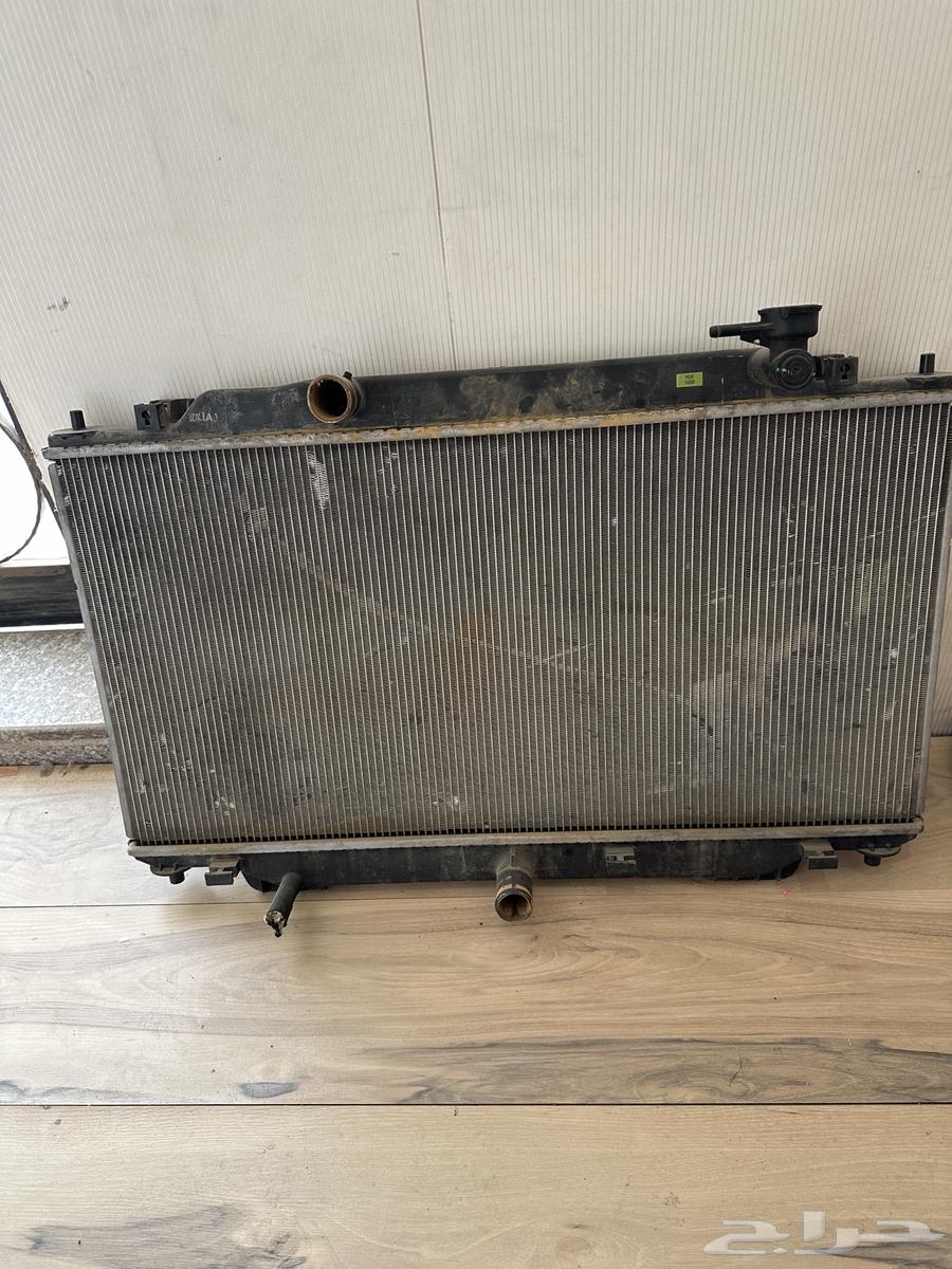 رديتر وطرمبة ماء مازدا 3 201664354311765122111