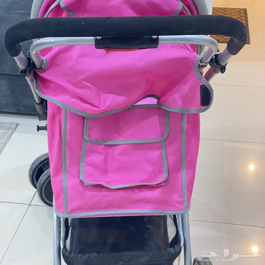 Two pink baby strollers with car seat64120416817025113