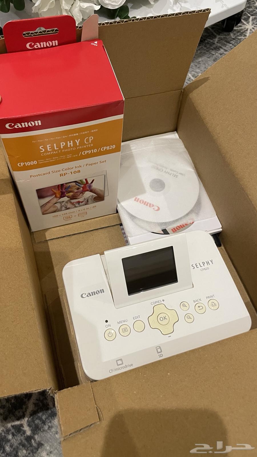 Canon CP820 printer, new with photo paper and ink64142466862466110
