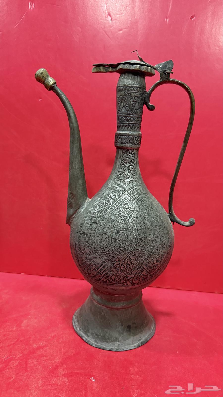 إبريق نحاس منقوش بالكامل63654695319683112