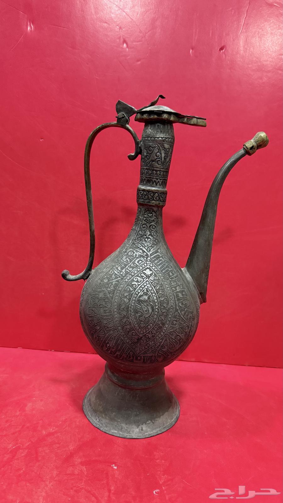 إبريق نحاس منقوش بالكامل63654695319683110