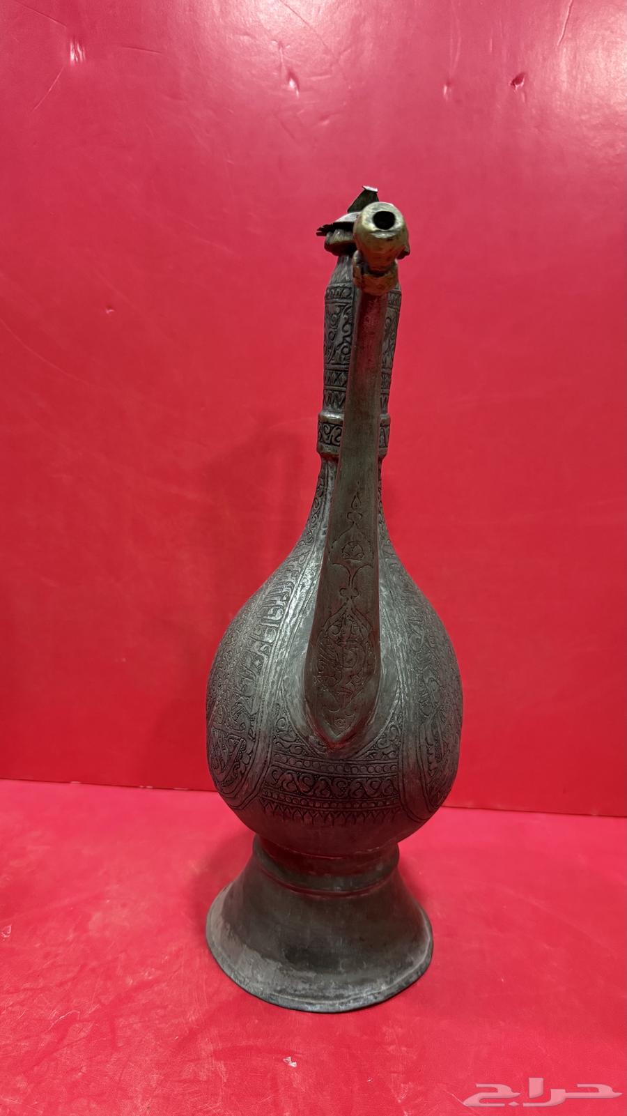 إبريق نحاس منقوش بالكامل63654695319683111