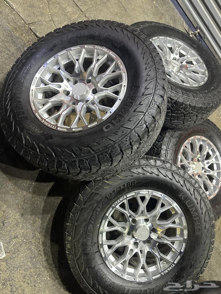 جنوط تتانيا 6 مسمار مع كفرات كومو ربع حجري مقاس 285 1764368630635266111