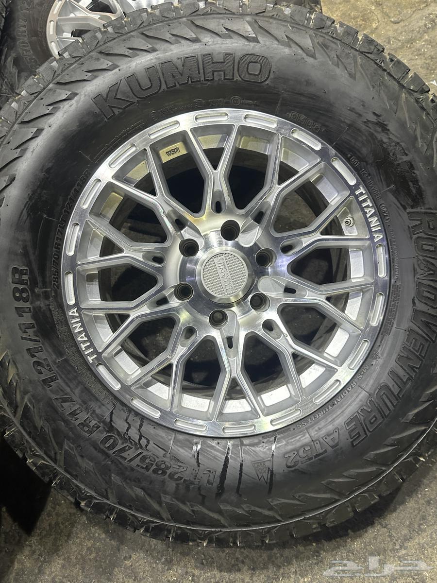 جنوط تتانيا 6 مسمار مع كفرات كومو ربع حجري مقاس 285 1764368630635266113