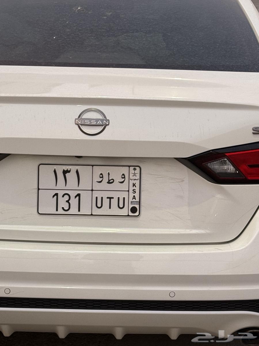 Double lock board with letters and numbers, the numbers are distinctive, standing and include ط and 13164371263622019110