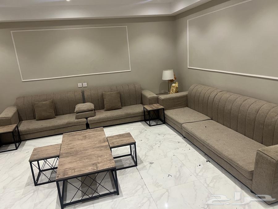Sofa with table and curtain64122292537218112