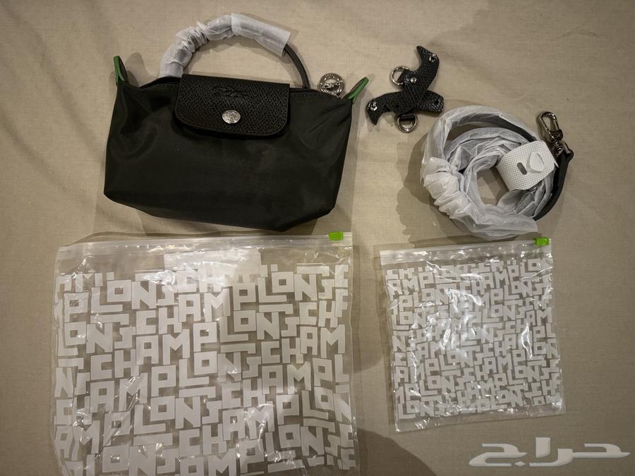 شنطة لونشان longchamp زيتيه جديده64143081947907110
