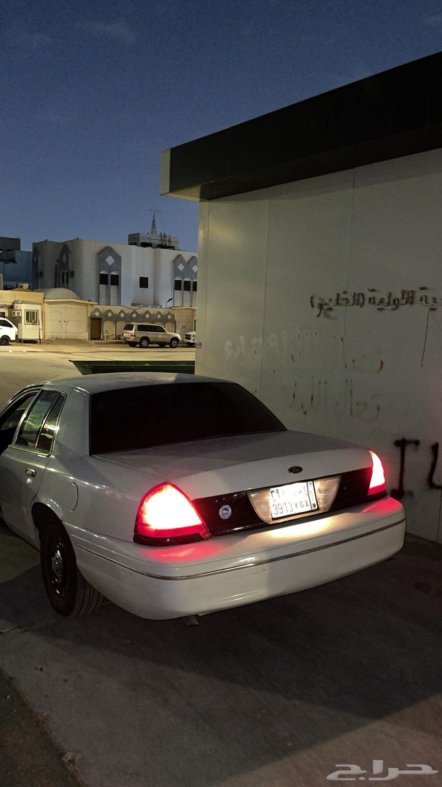 فورد بوليسي ابيض64408244663425110