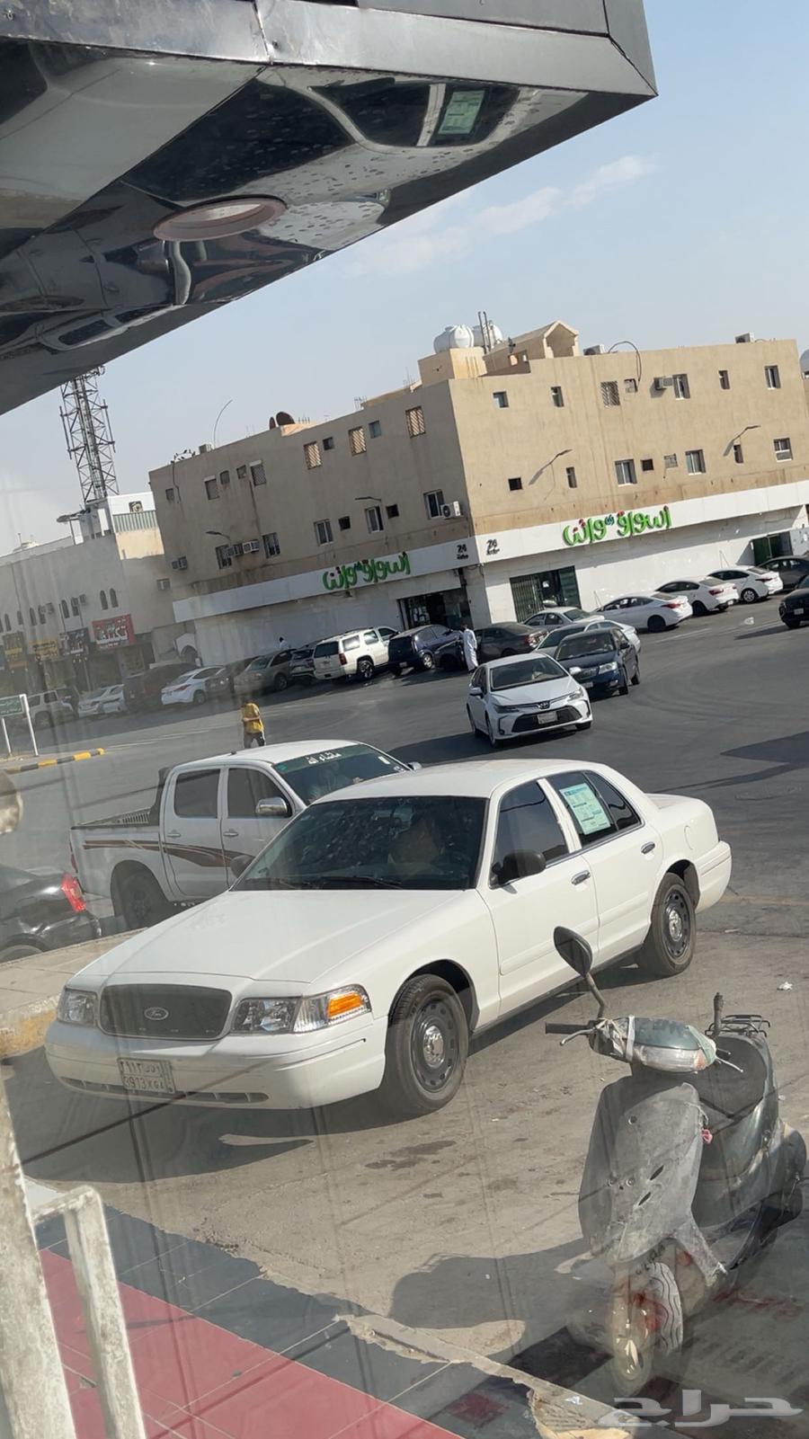 فورد بوليسي ابيض64408244663425112