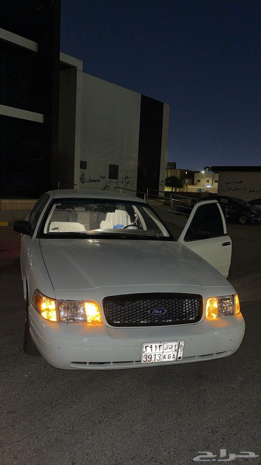 فورد بوليسي ابيض64408244663425114