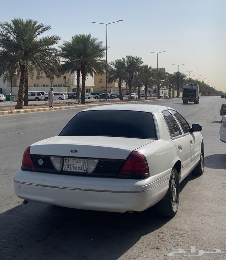 فورد بوليسي ابيض64408244663425113