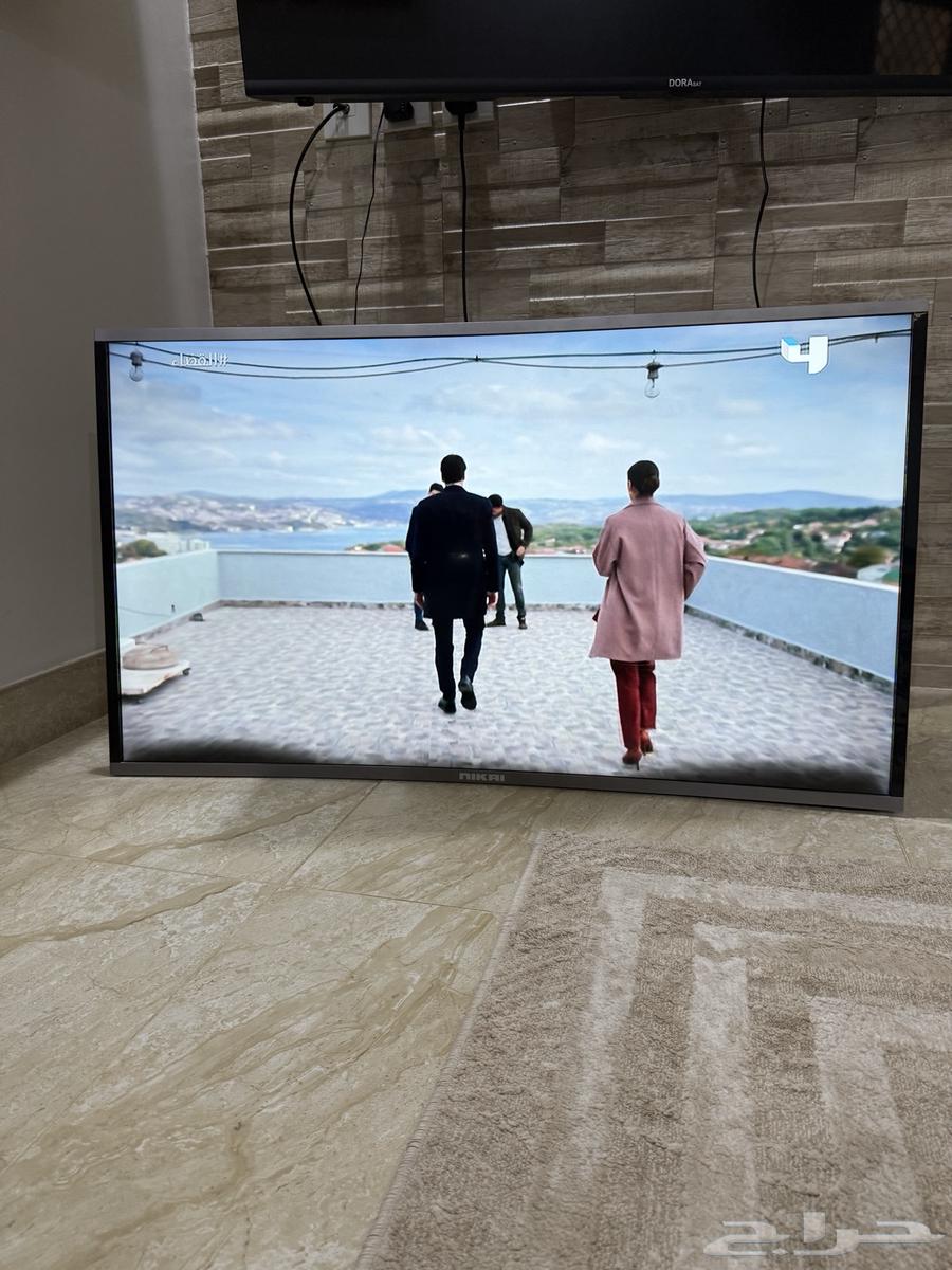 تلفزيون و طاوله64220860498435110