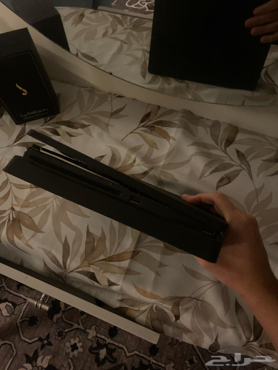 索尼4成色很新，带光盘和一个国产手柄64230803265283111