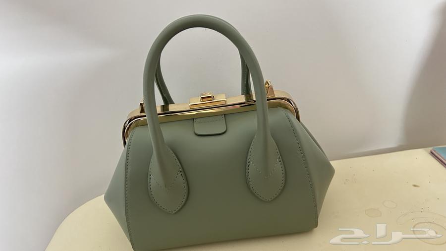 شنطة براند بريطاني اصلي64212977063425110