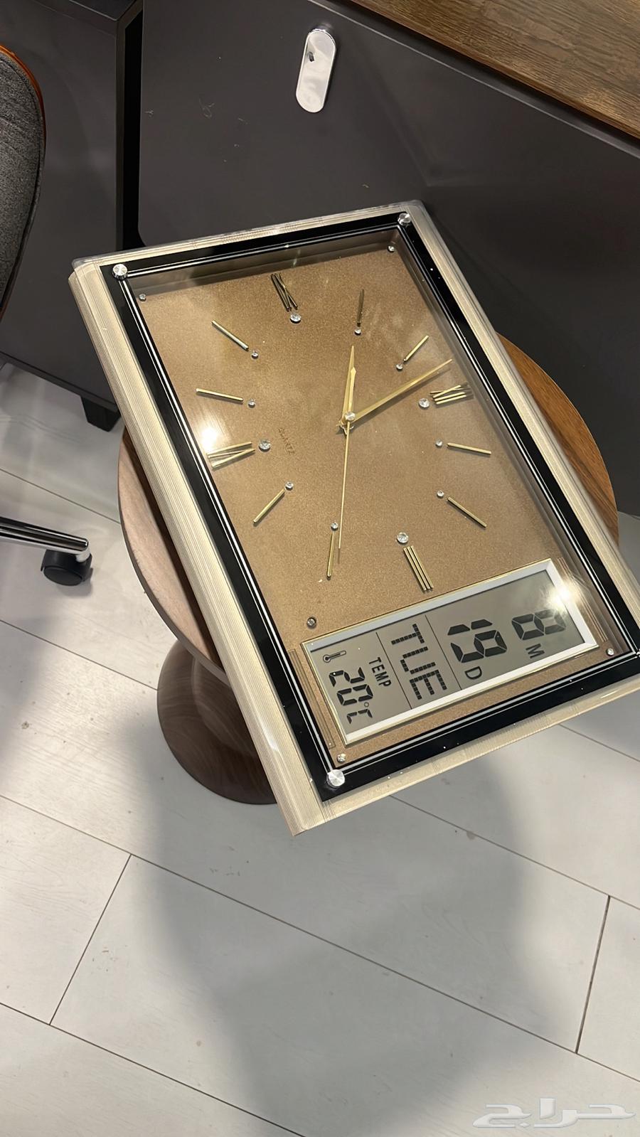 Luxurious clock, two new office chairs, tree64240232010754110