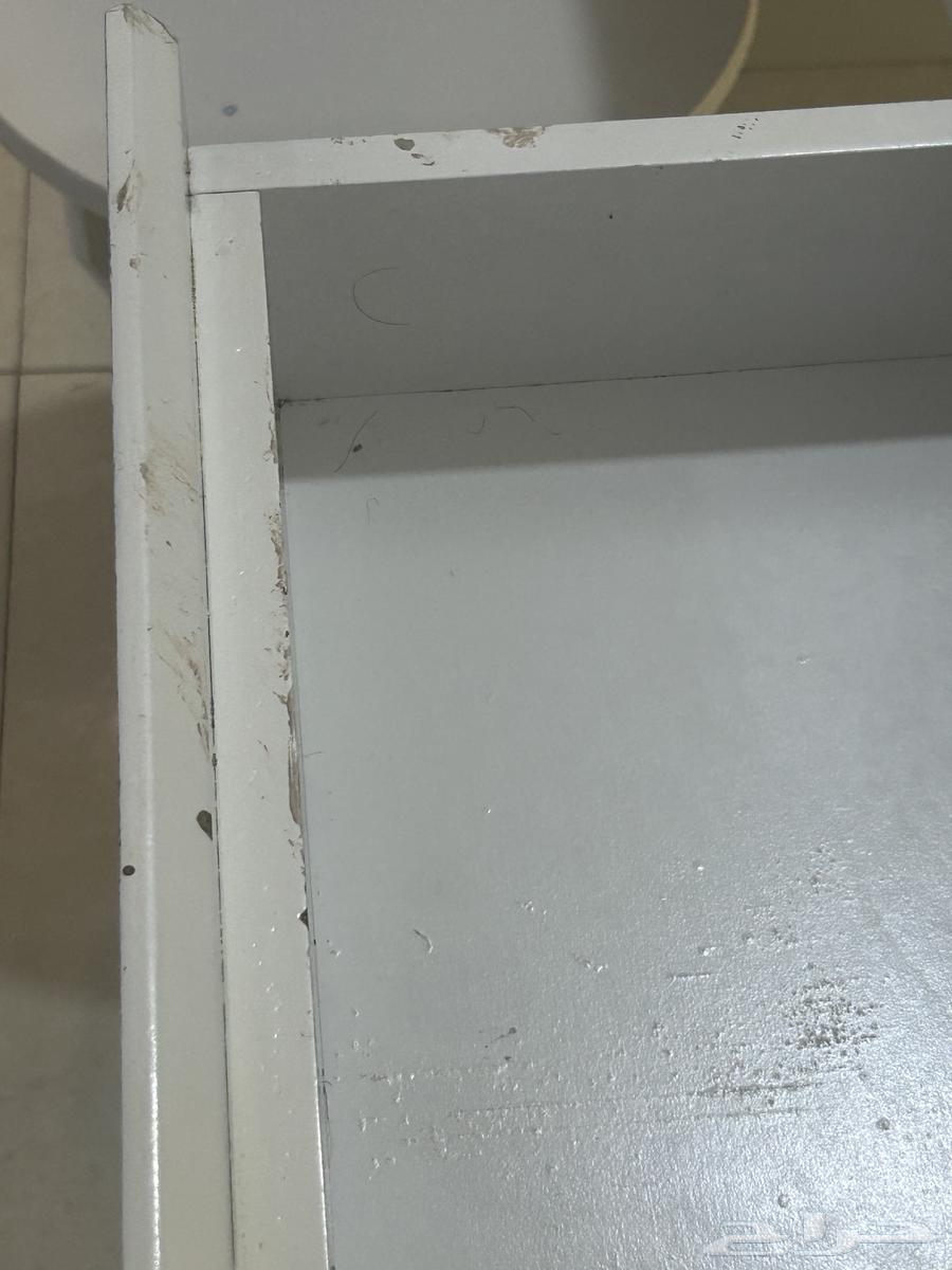 A small setup with a TV table that has slight scratches as shown in the photo64243691967618113