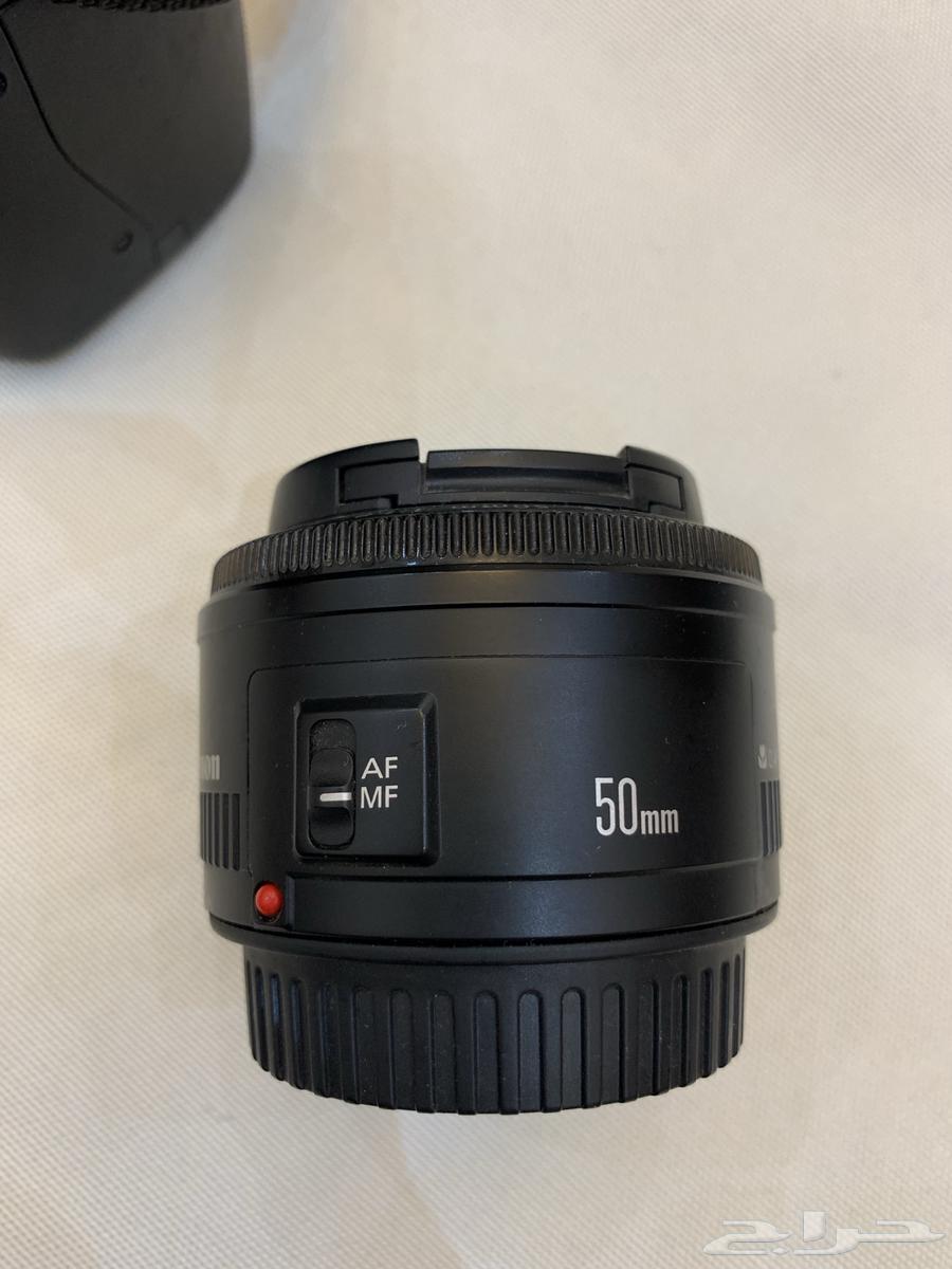 Canon 1100D camera with complete accessories, 50mm lens, and tripod64245481532419110