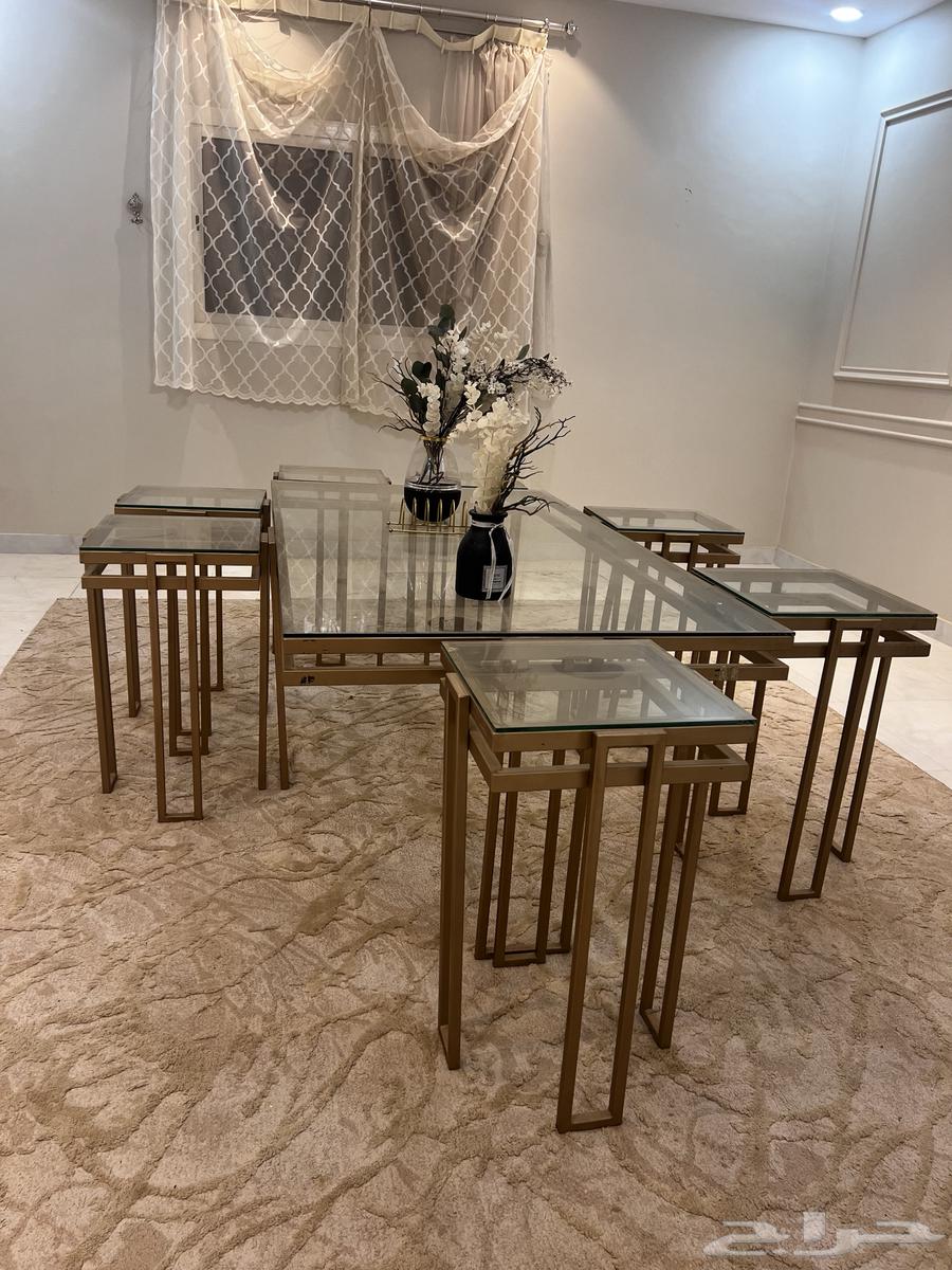 Large table with seven side tables for auction, base price 250064250753918851110