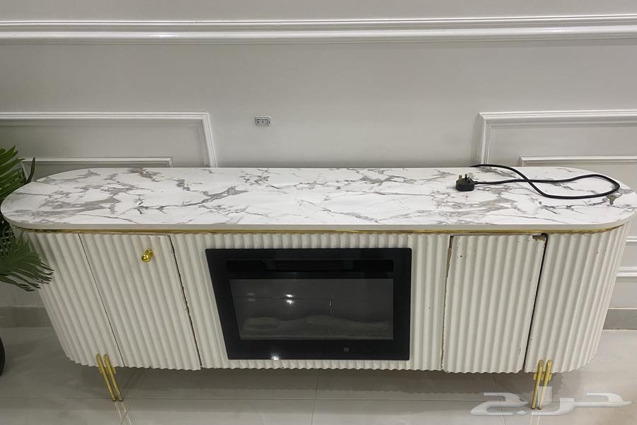 طاوله تلفاز ومدفئه حراريه وفيها سماعه بلوتوث64235920939521110