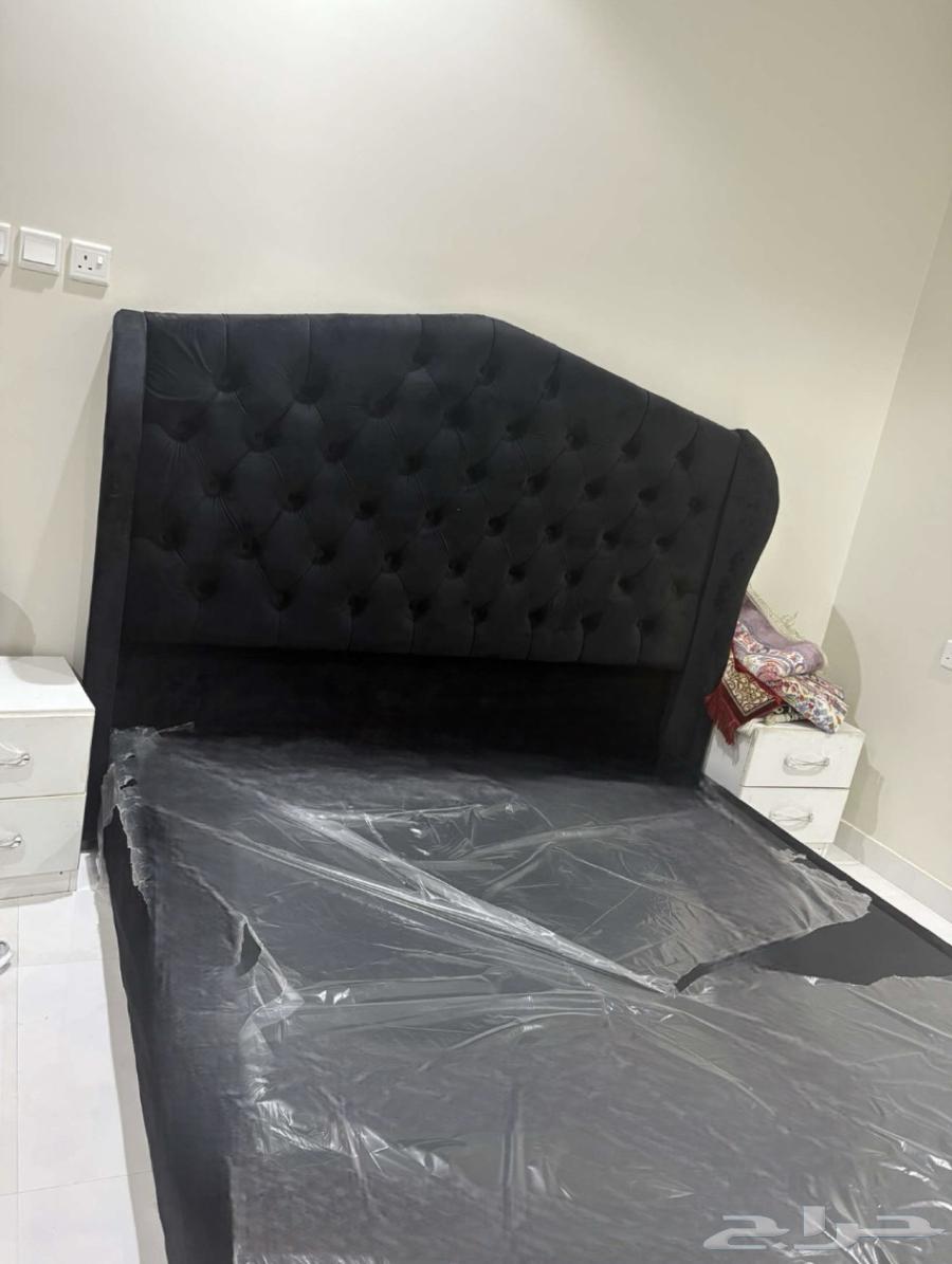 A bedroom set consisting of a bed and two 4-drawer dressers, located in Abha city64234454070529110