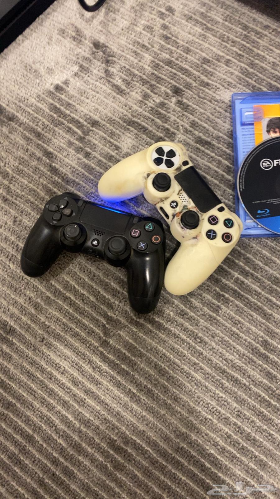 Sony DualShock with two hands and two straps new64259463349761114