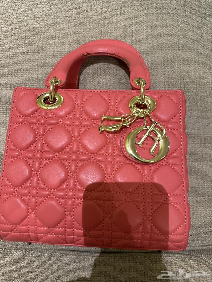 شنطه ماركه Dior لون وردي ذهبي مستعمله للبيع64259822290305110