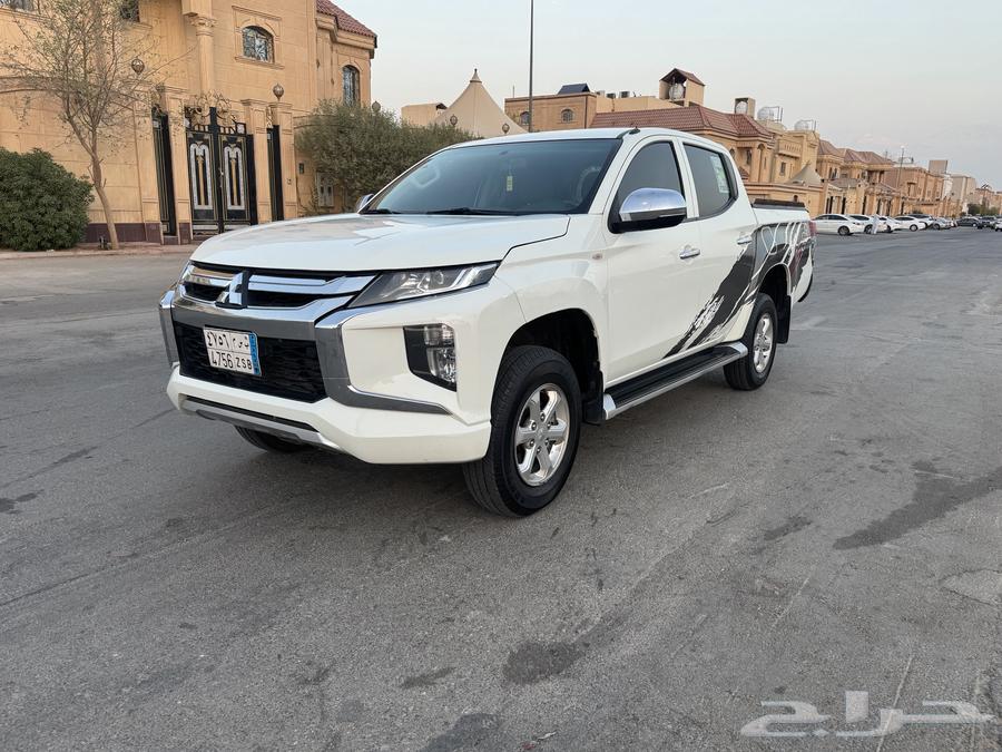 ميتسوبيشي L200 2022 فل كامل ابيض64425475454081111