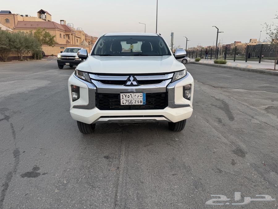 ميتسوبيشي L200 2022 فل كامل ابيض64425475454081110