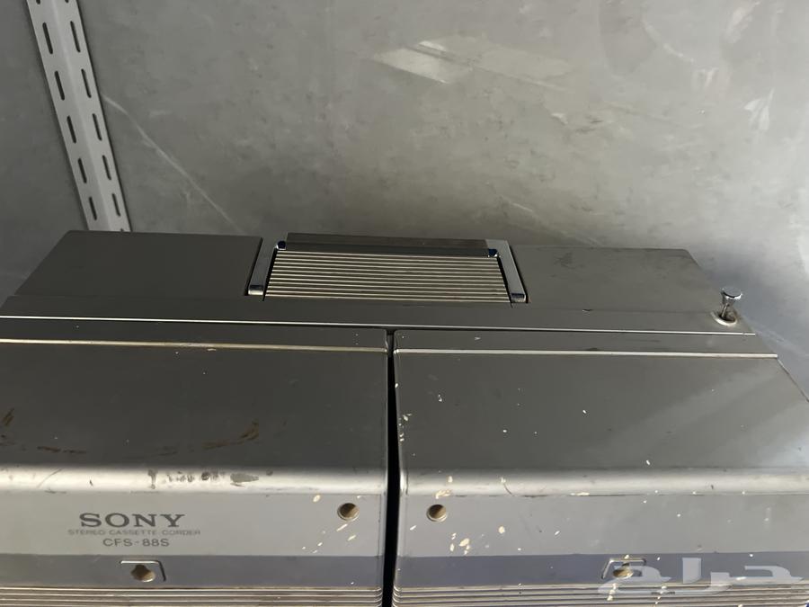 Vintage radio and cassette player, heritage item needing repair, foldable64264293257090112