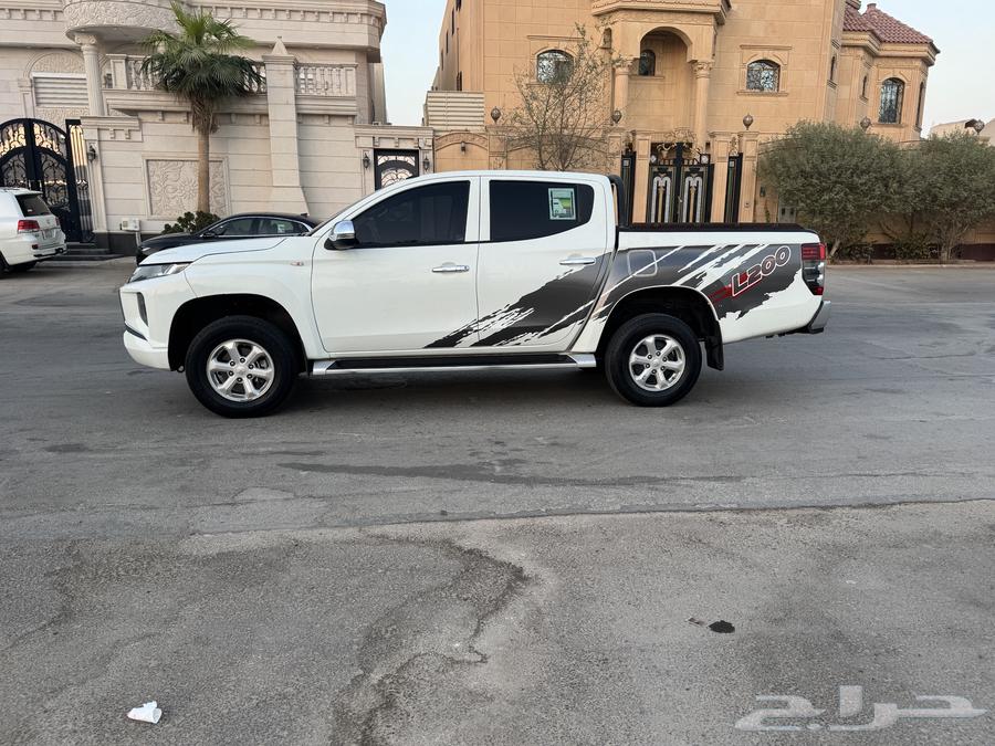 ميتسوبيشي L200 2022 فل كامل ابيض64425475454081112