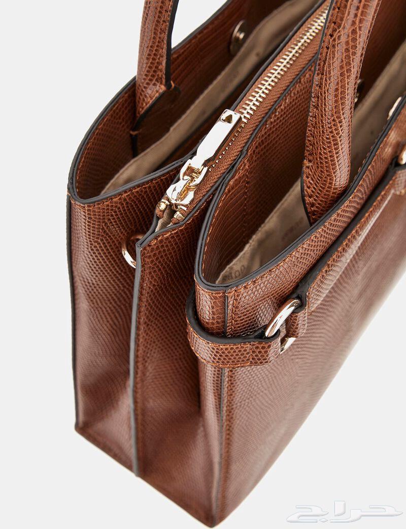 شنطة جديدة ماركة GUESS64264122026371111