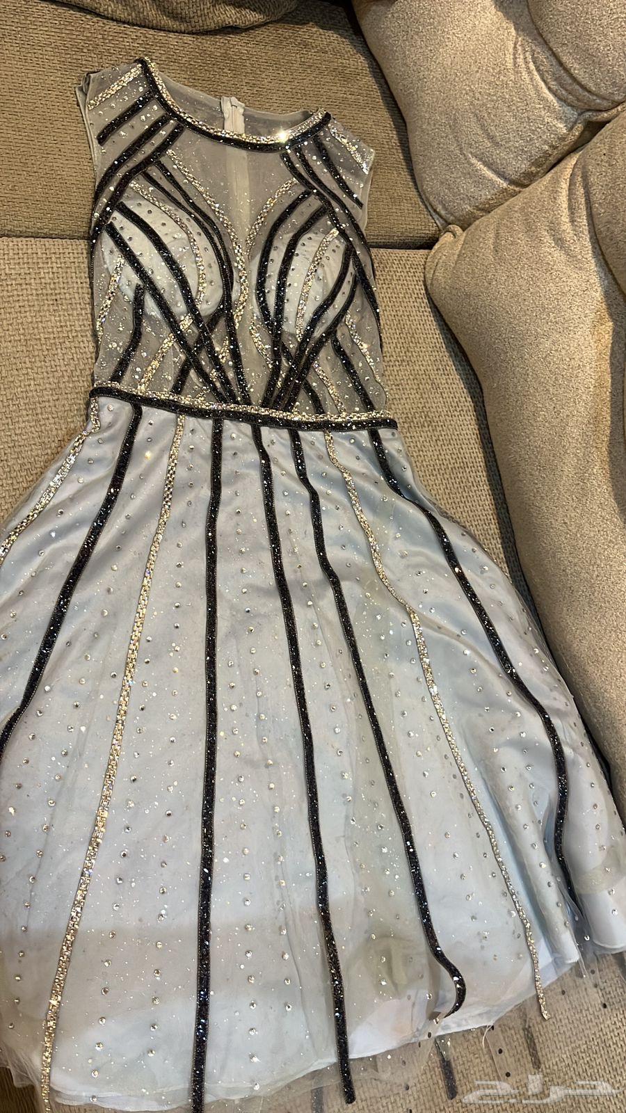 فستان من مصممة كان ب 120064260041119874110