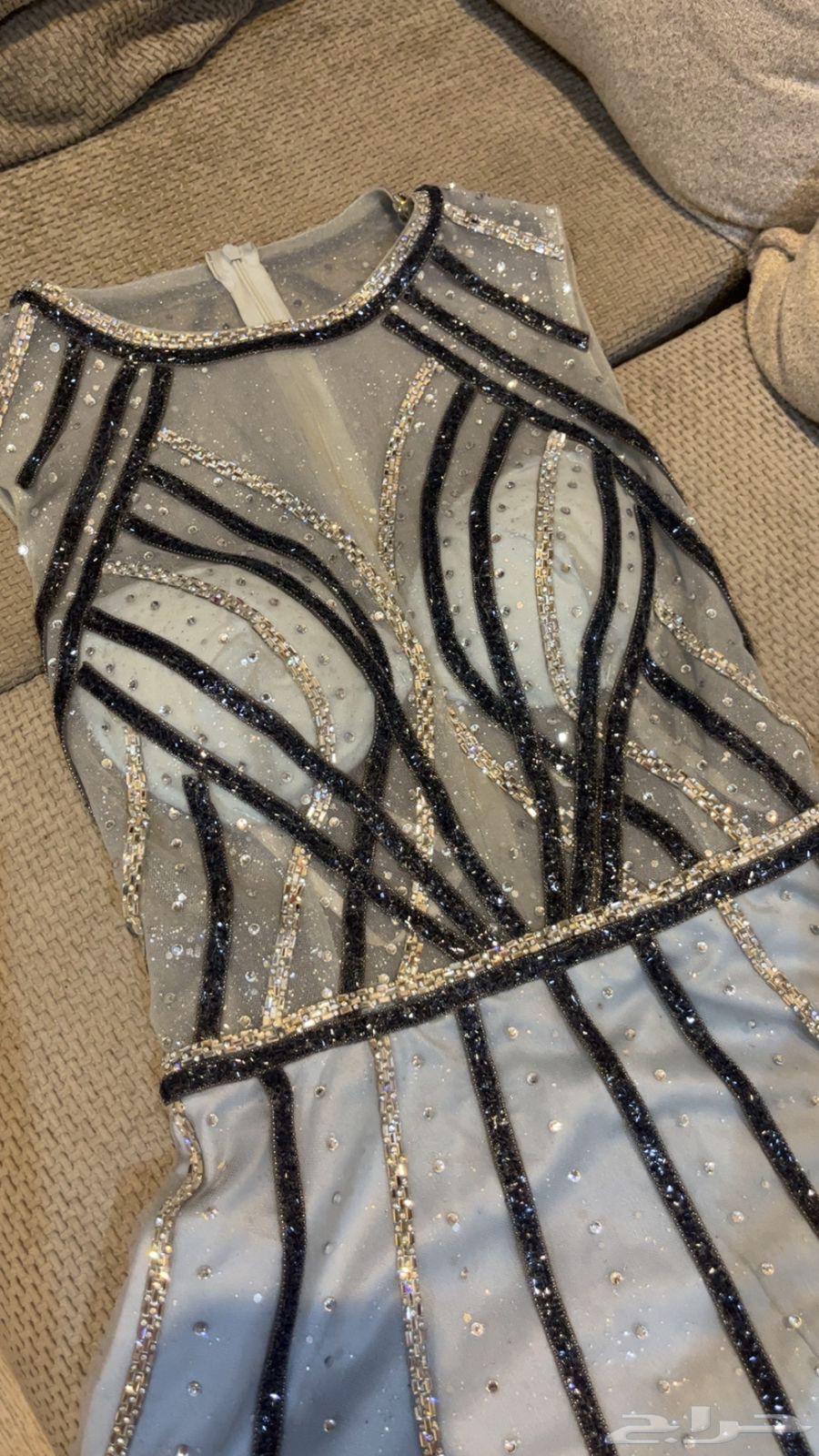 فستان من مصممة كان ب 120064260041119874111