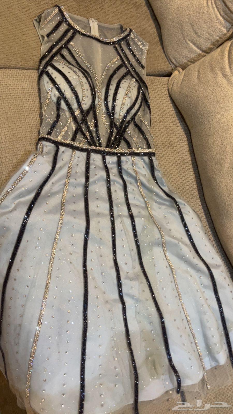 فستان من مصممة كان ب 120064260041119874113