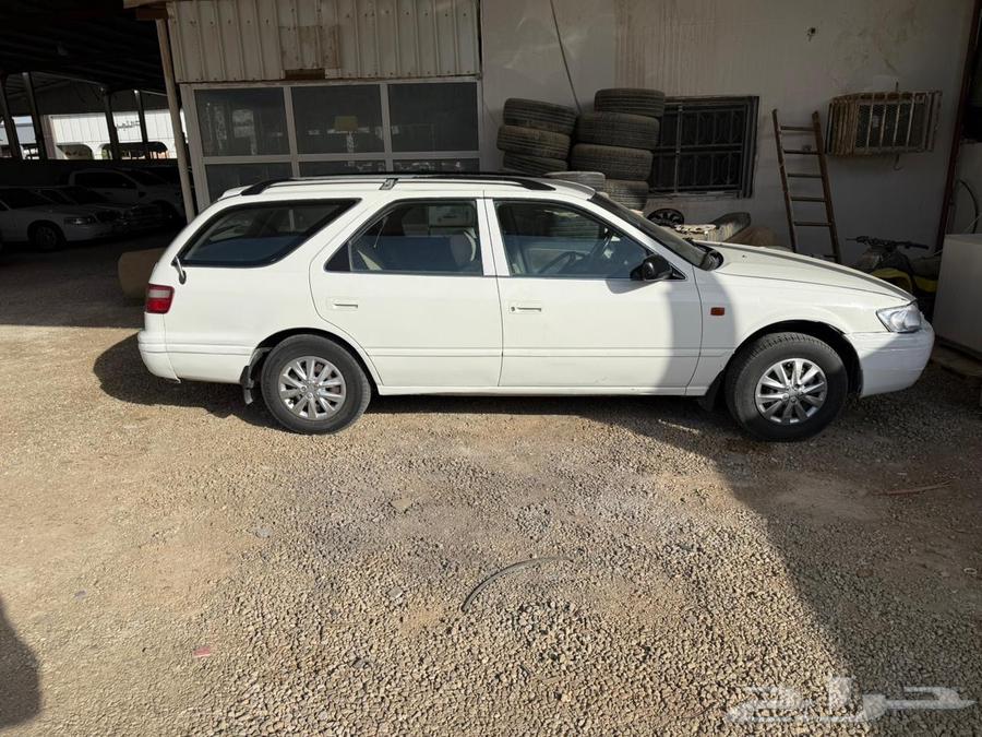 Camry with a dent in the trunk64439185714691111